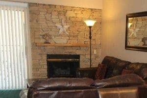 A romantic stone fireplace at one of our Gatlinburg condos.