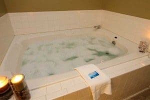 A bubbly Jacuzzi tub at one of our Gatlinburg cabin rentals.